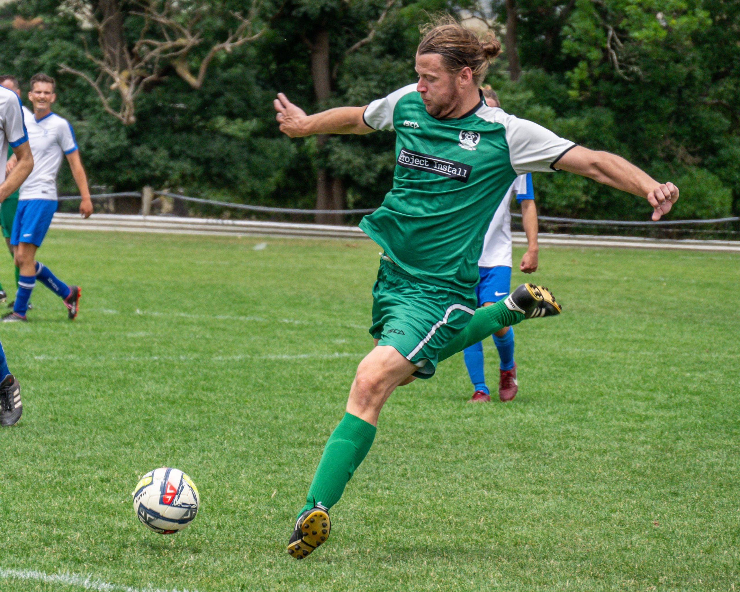 Sale United Football Club's Marrien van den Heuvel takes a shot at goal.