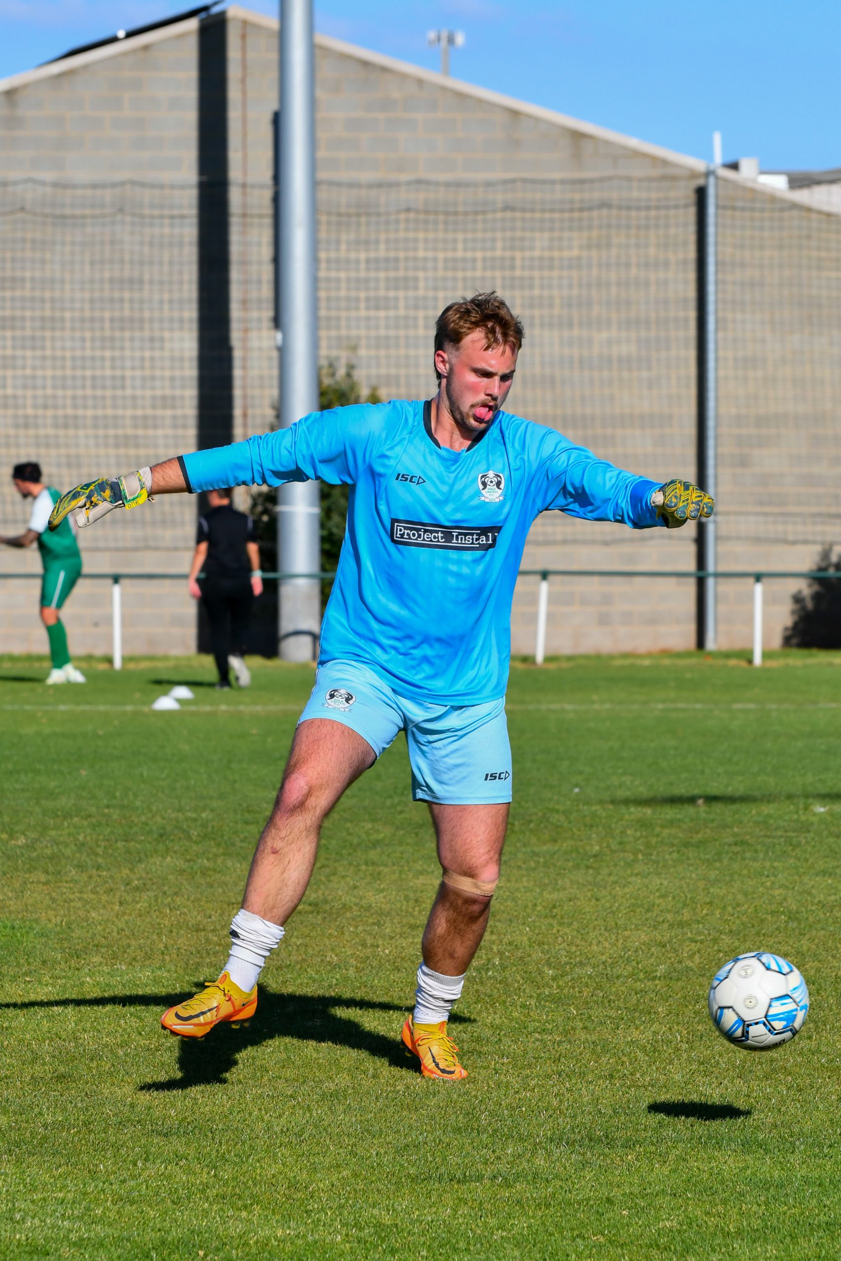 Sale United goalkeeper Damon Stephens warming up before the Swans' first-ever Australia Cup match